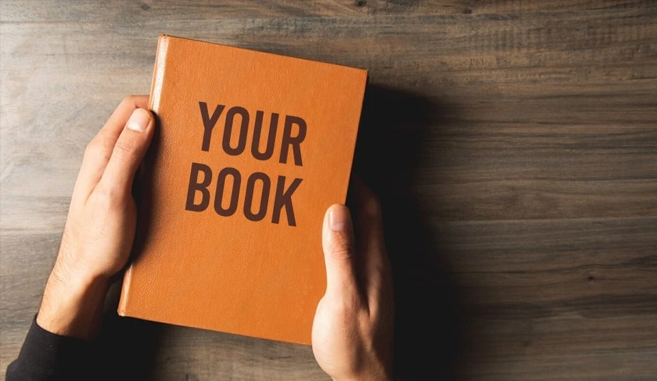 Hands holding a book